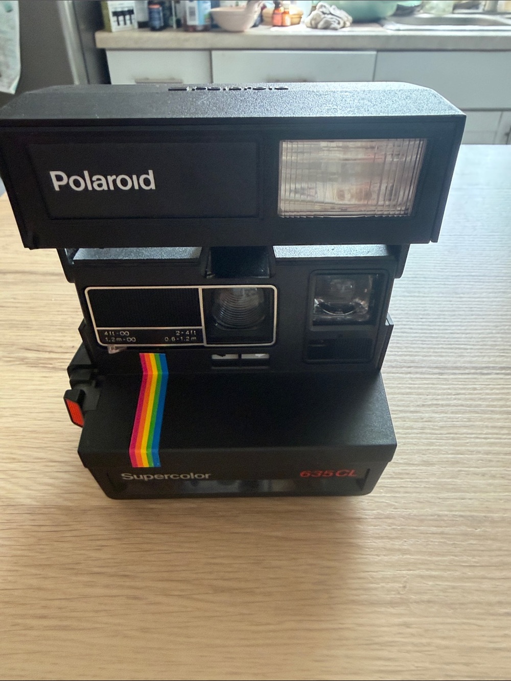 Polaroid Supercolor 635CL Instant Camera in Black with Rainbow Stripe